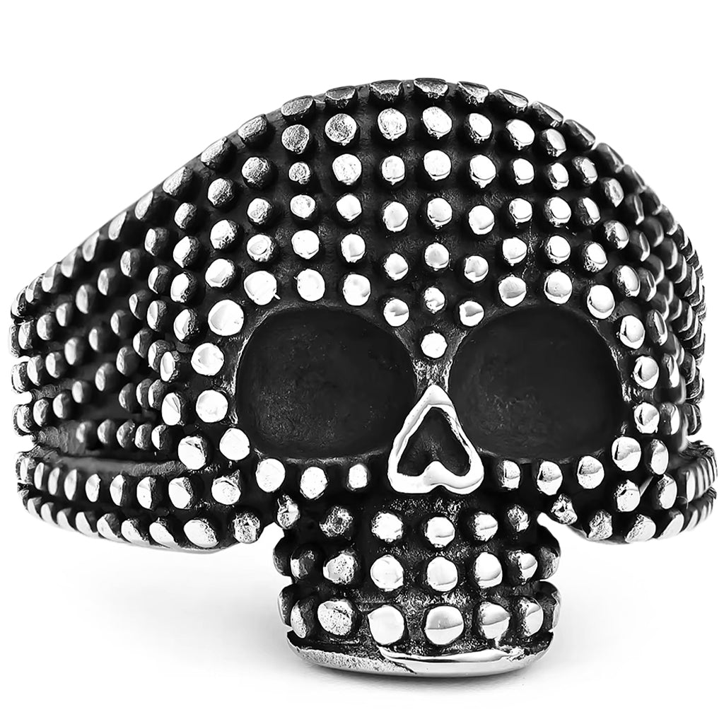 Dödskallering täckt med flera små stålkulor