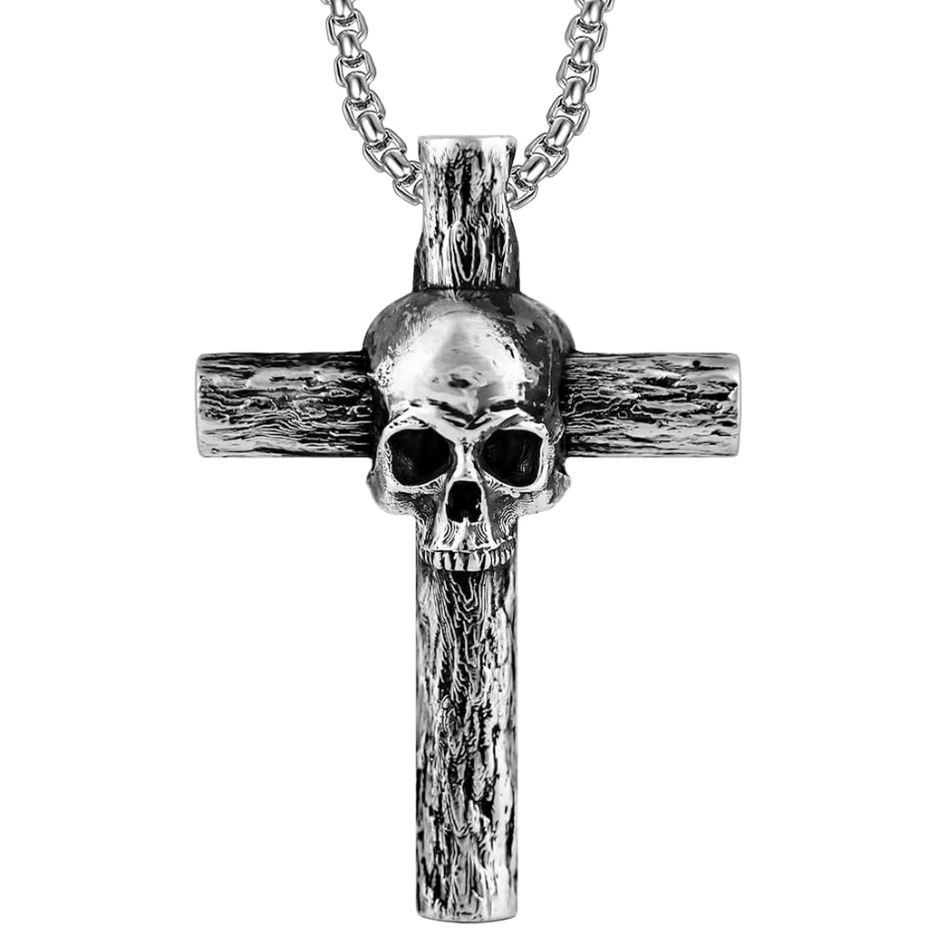 Silverfärgat hängsmycke föreställande ett latinskt kors med en dödskalle i centrum