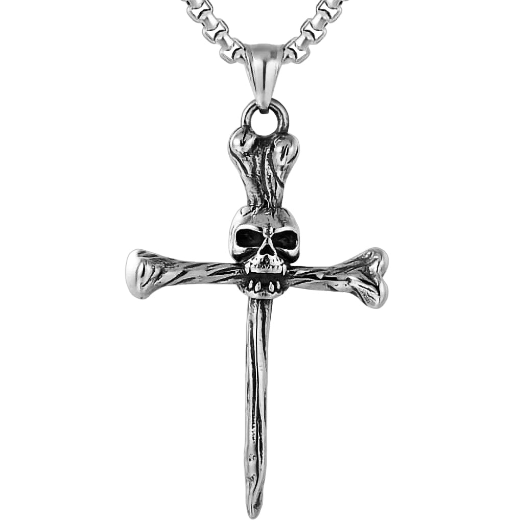 Silverfärgat smycke föreställande ett benknotor-kors med en dödskalle i centrum