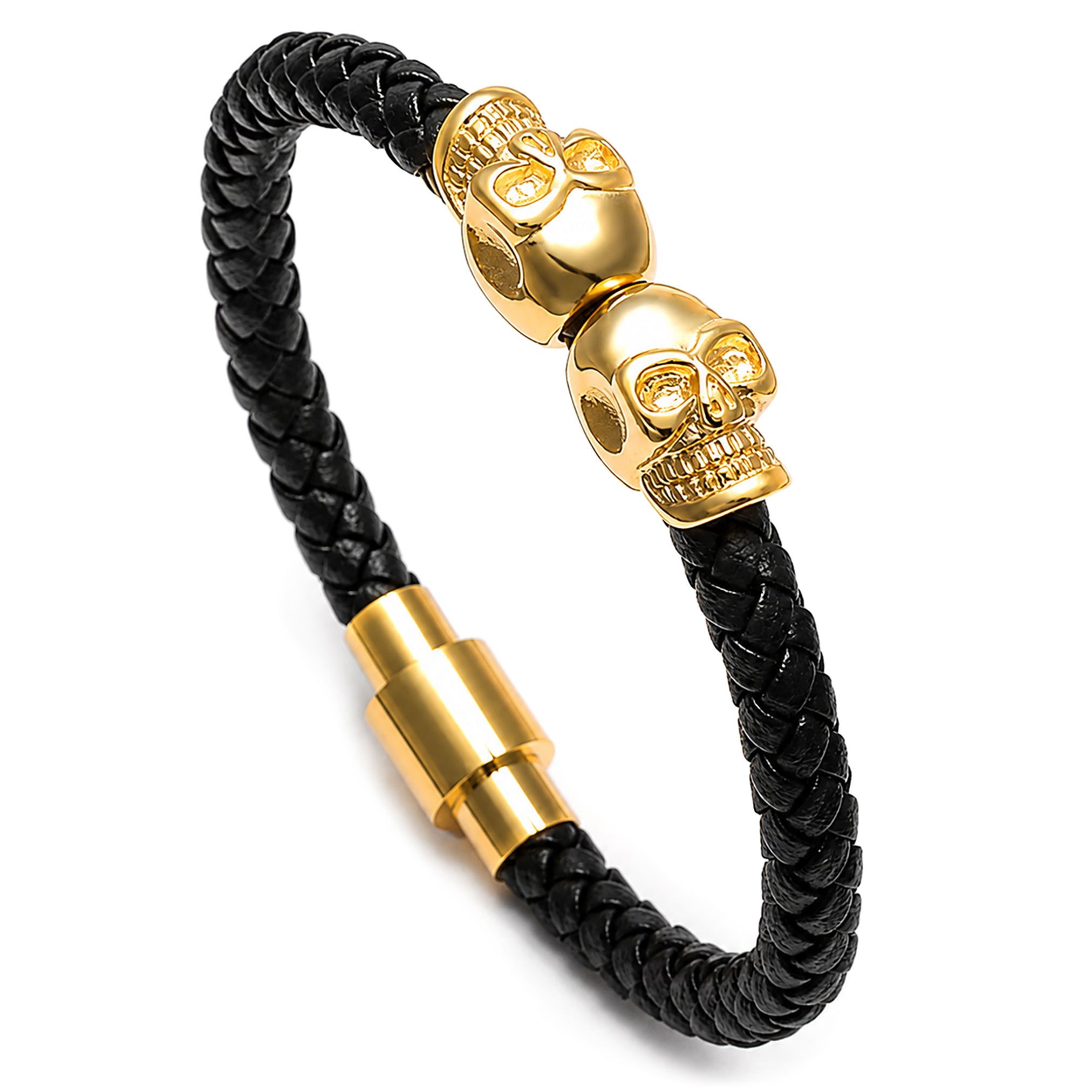 Svart läderarmband med två dödskallar av guldtonat rostfritt stål