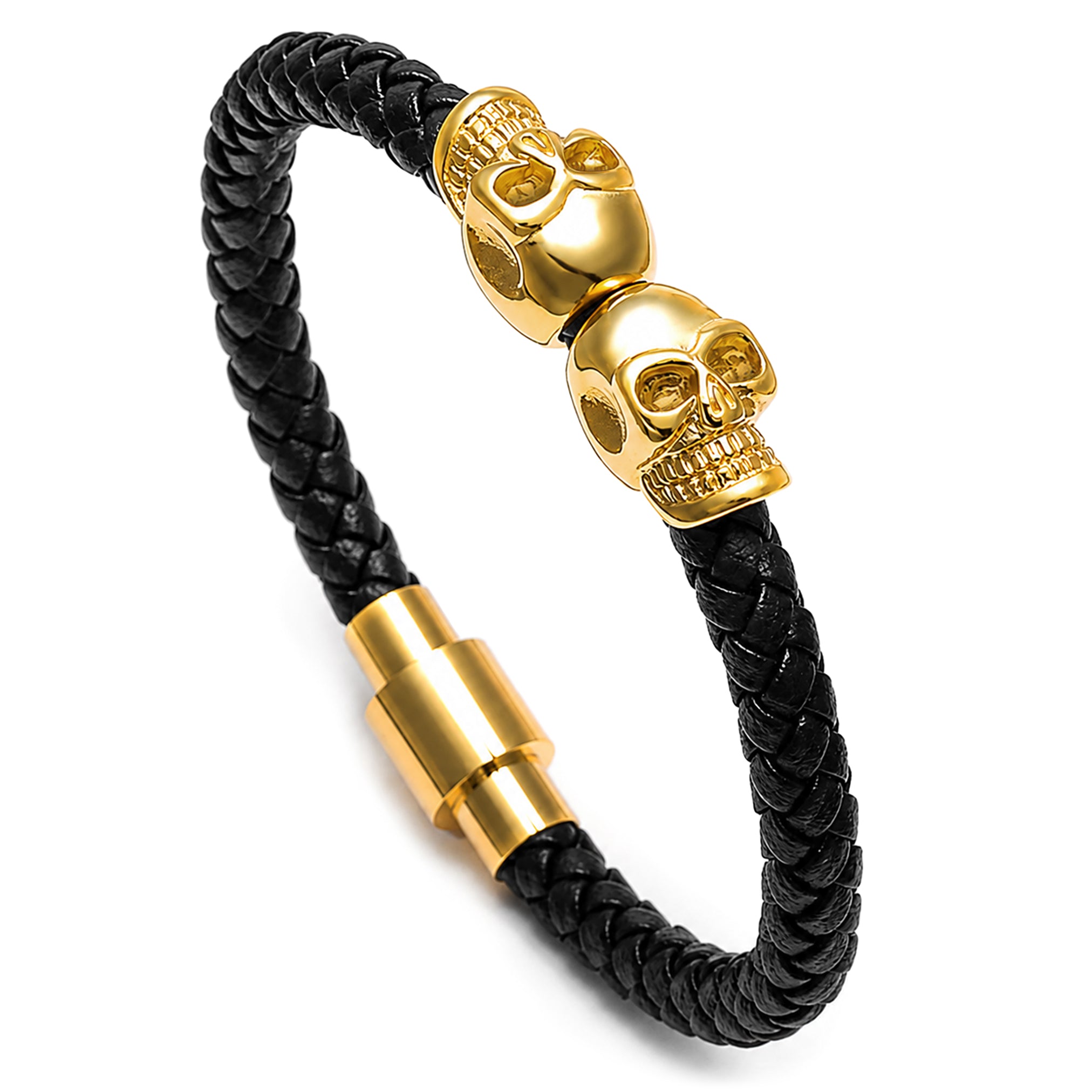 Svart läderarmband med två dödskallar av guldtonat rostfritt stål