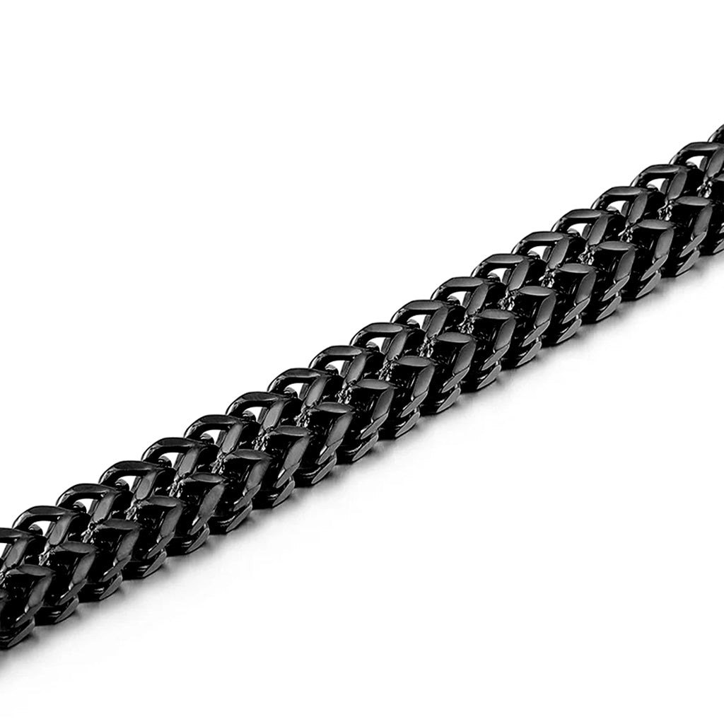 Svart mesh-armband i stål med dödskallar – stilrent och rockigt smycke för en tuff look