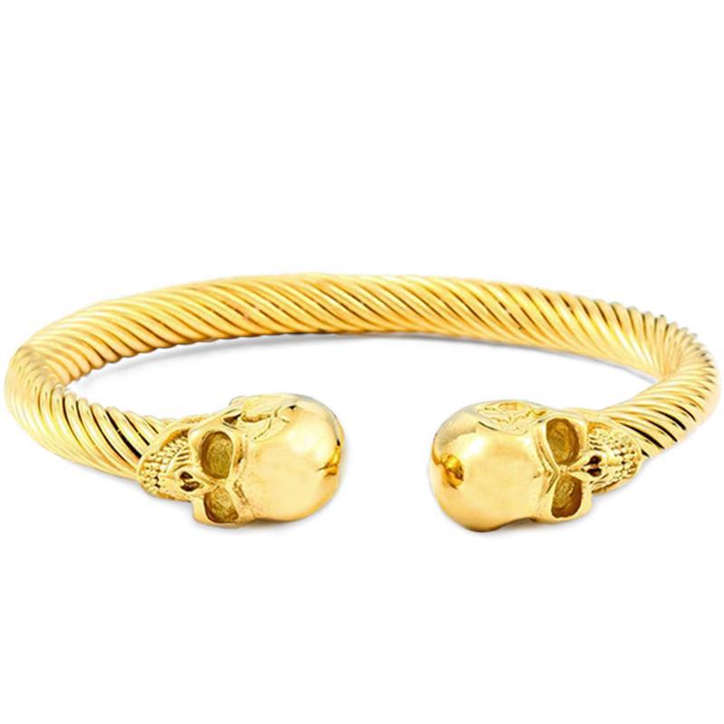 Manschettarmband Två Kranium Guld