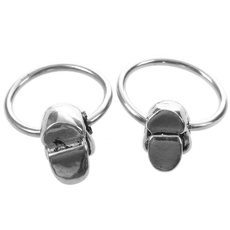 Stålörhängen Med Dödskallar