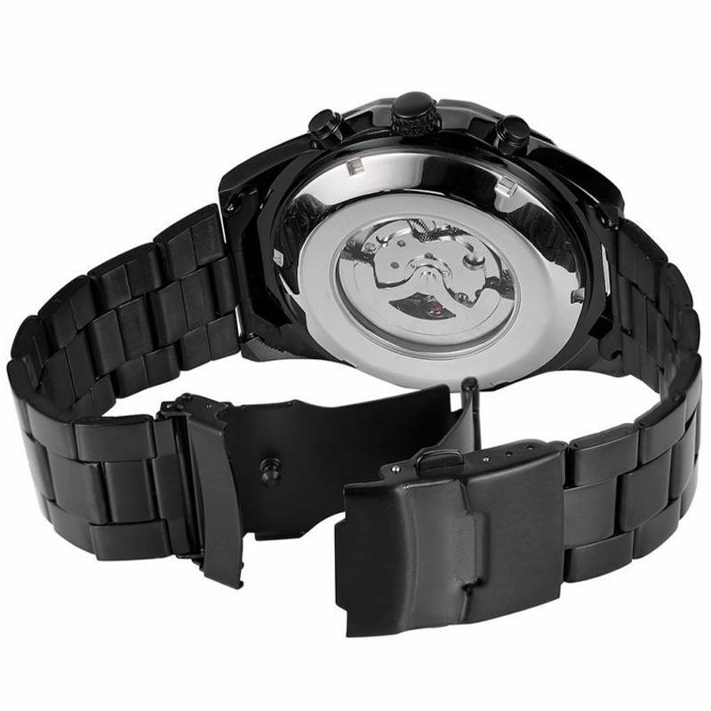 Svart Mekanisk Klocka