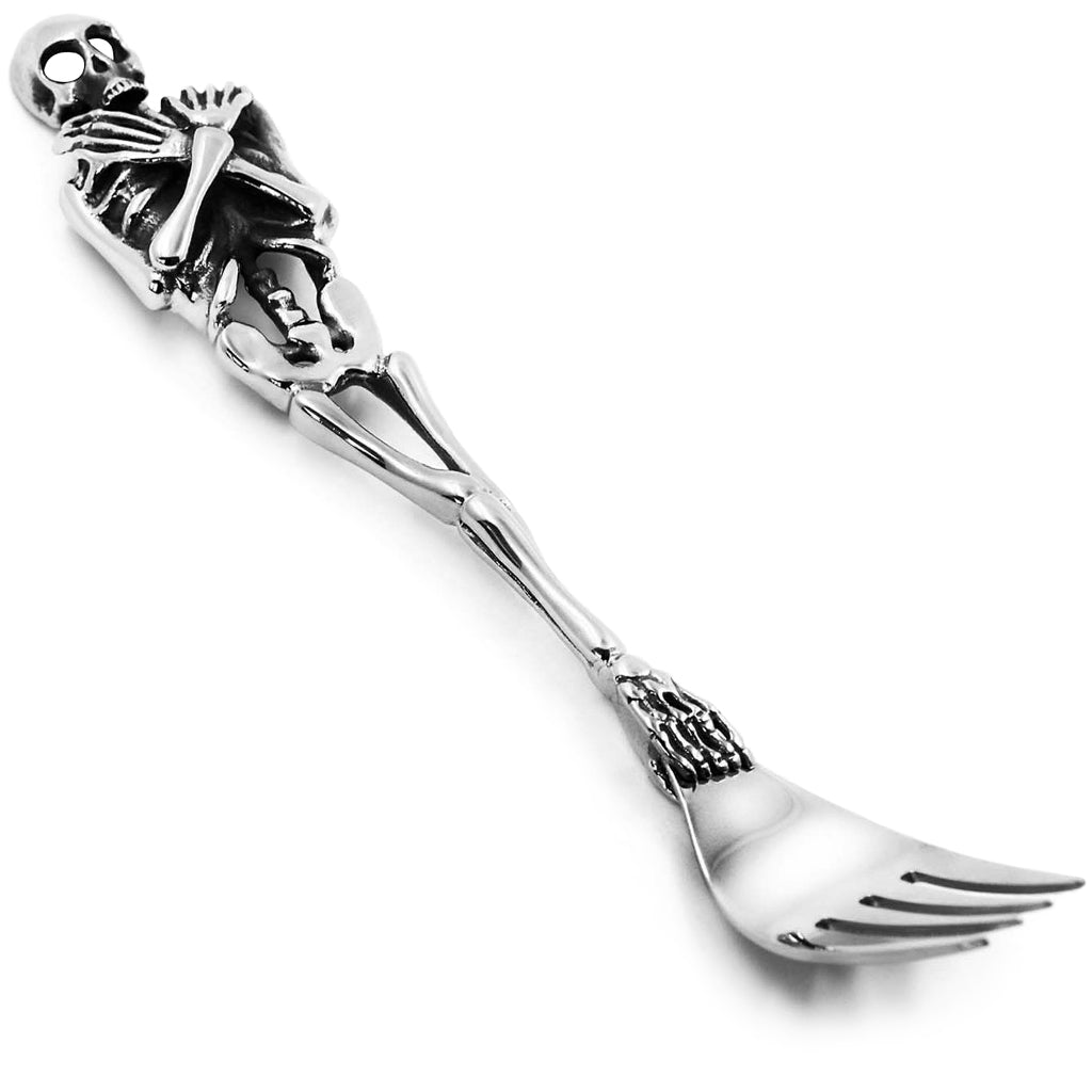 Silverfärgad gaffel i rostfritt stål föreställande ett skelett