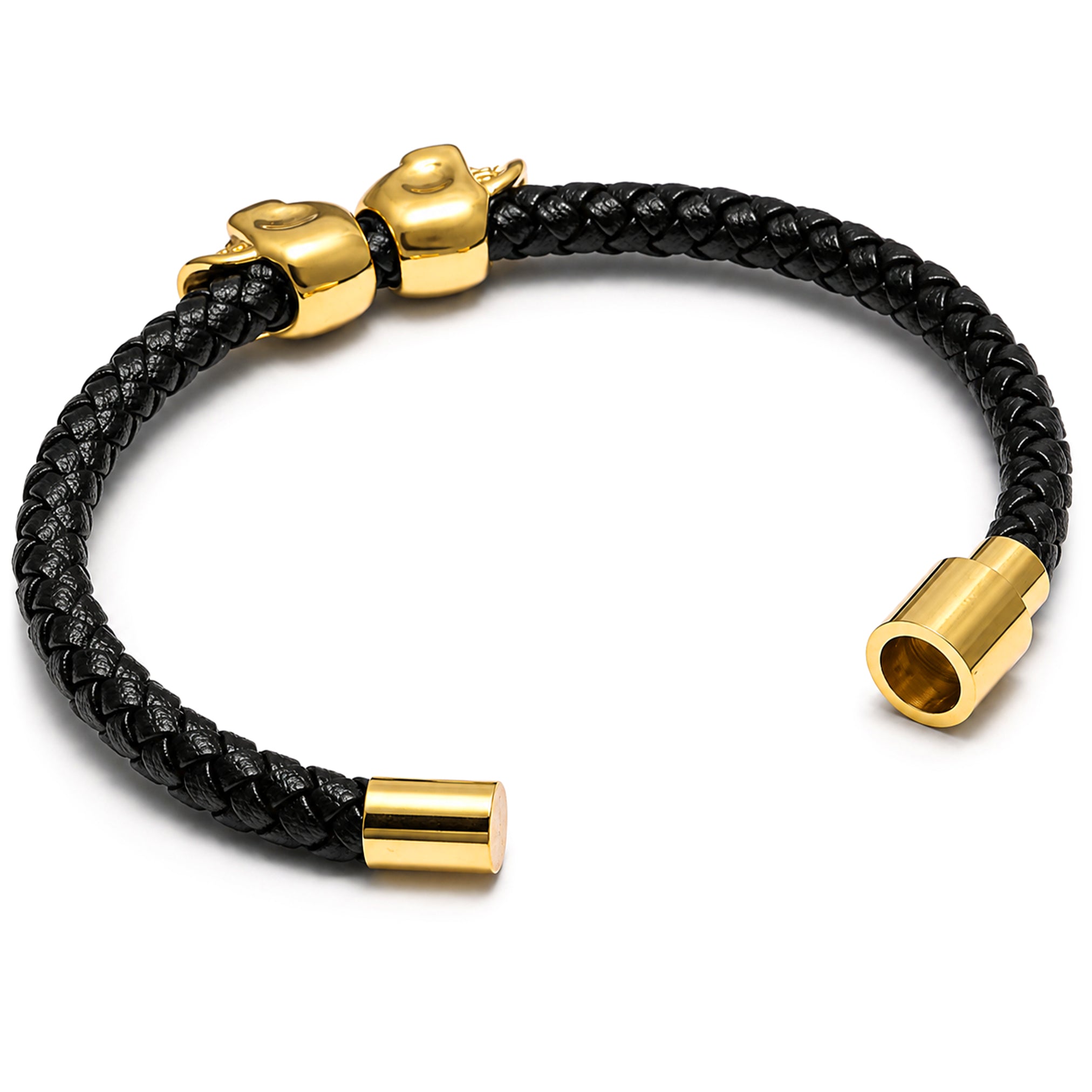 Svart armband av äkta läder med två guldiga dödskallar av rostfritt stål